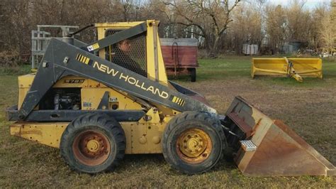 data l783 new holland skid steer|new holland l783 bucket.